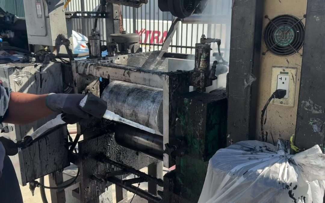 Ice Blast Works technician performing dry ice blasting on an active job site