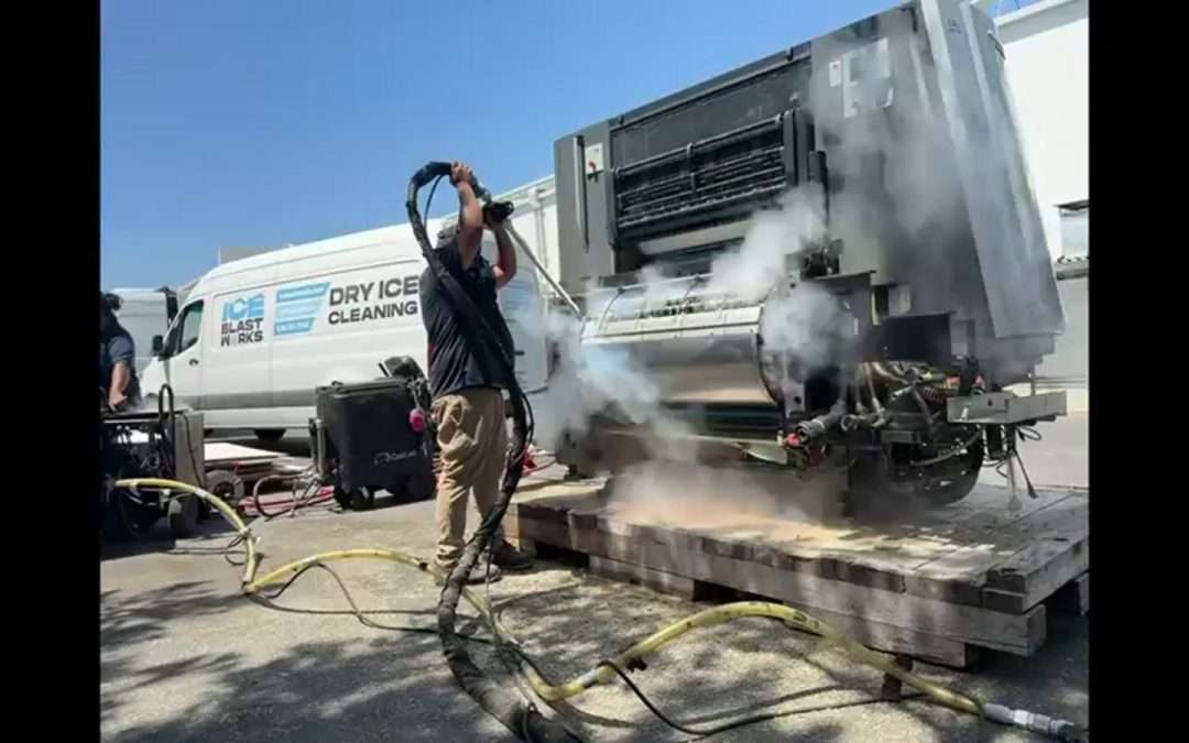 Ice Blast Works technician performing dry ice blasting on an active job site